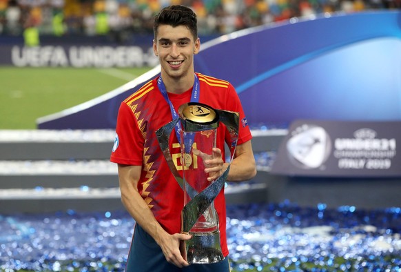 Spain U21, U 21 v Germany U21 - UEFA European Under-21 Championship - Final - Stadio Friuli Spain U21 s Marc Roca celebrates with the trophy after winning the UEFA European Under-21 Championship Final ...