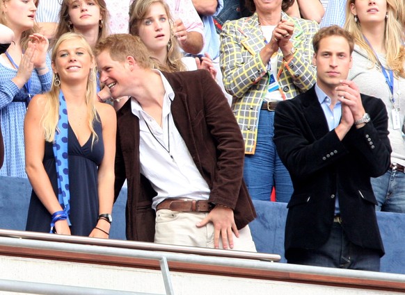 LONDON - JULY 01: Their Royal Highnesses Prince William (R) and Prince Harry (C) and guest Chelsy Davy (L) watch the Concert for Diana at Wembley Stadium on July 1, 2007 in London, England. The Concer ...