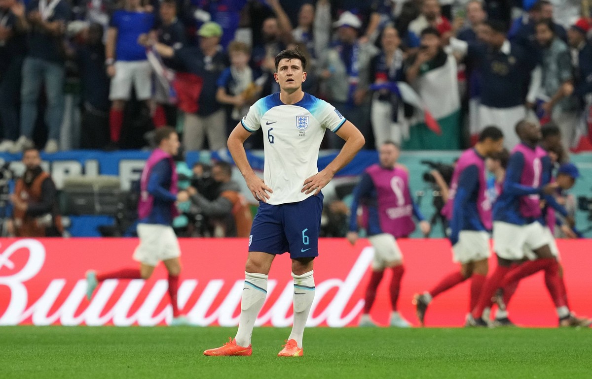 England v France - FIFA World Cup, WM, Weltmeisterschaft, Fussball 2022 - Quarter Final - Al Bayt Stadium England s Harry Maguire stands dejected after France s Olivier Giroud scores their second goal ...