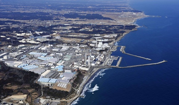 10 years after Great East Japan Earthquake Photo taken from a Kyodo News helicopter shows the Fukushima Daiichi nuclear power plant crippled in the March 11, 2011, Great East Japan Earthquake, in Fuku ...