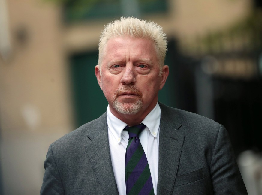 German Boris Becker arrives at Southwark Crown Court escorted by his partner Lilian de Carvalho Monteiro in London on Friday, April 29, 2022.Six time Grand Slam tennis champion is being sentenced toda ...