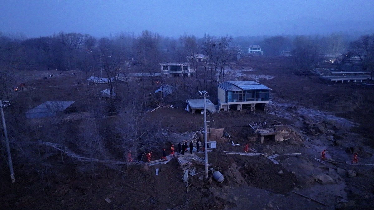 231219 -- HAIDONG, Dec. 19, 2023 -- This aerial photo taken on Dec. 19, 2023 shows the mudslide-struck Caotan Village in Minhe Hui and Tu Autonomous County of Haidong City, northwest China s Qinghai P ...