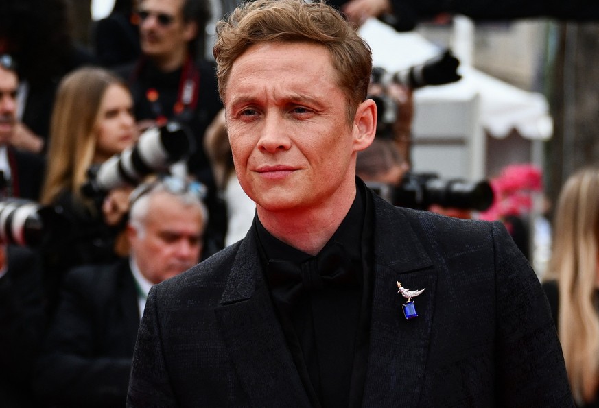 German actor Matthias Schweighoefer arrives for the opening ceremony and the screening of the film &quot;Jeanne du Barry&quot; during the 76th edition of the Cannes Film Festival in Cannes, southern F ...