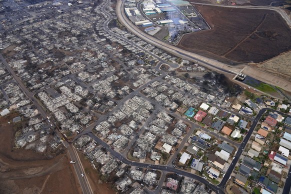 Wildfire wreckage is seen Thursday, Aug. 10, 2023, in Lahaina, Hawaii. The search of the wildfire wreckage on the Hawaiian island of Maui on Thursday revealed a wasteland of burned out homes and oblit ...