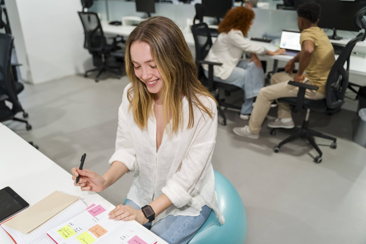 Creative business team collaborating and planning in modern office model released, Symbolfoto property released, JMHMF00868