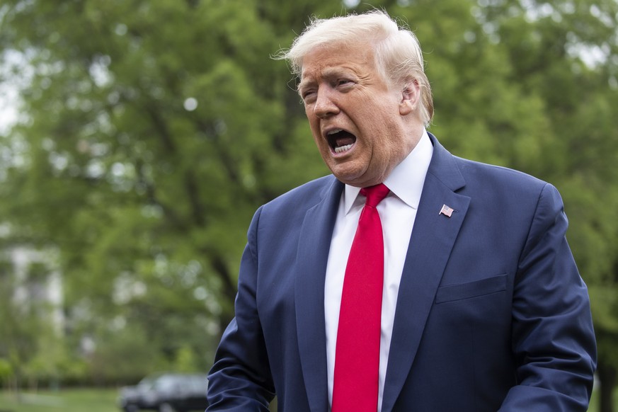 President Donald Trump speaks with reporters on the South Lawn of the White House as he departs on Marine One, Thursday, May 14, 2020, in Washington. Trump is en route to Allentown, Pa. (AP Photo/Alex ...