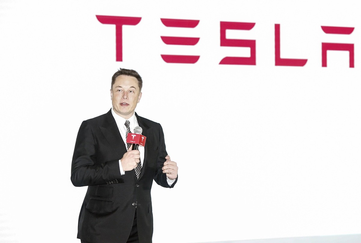 BEIJING, CHINA - OCTOBER 23: CHINA OUT Elon Musk, Chairman, CEO and Product Architect of Tesla Motors, addresses a press conference to declare that the Tesla Motors releases v7.0 System in China on a  ...