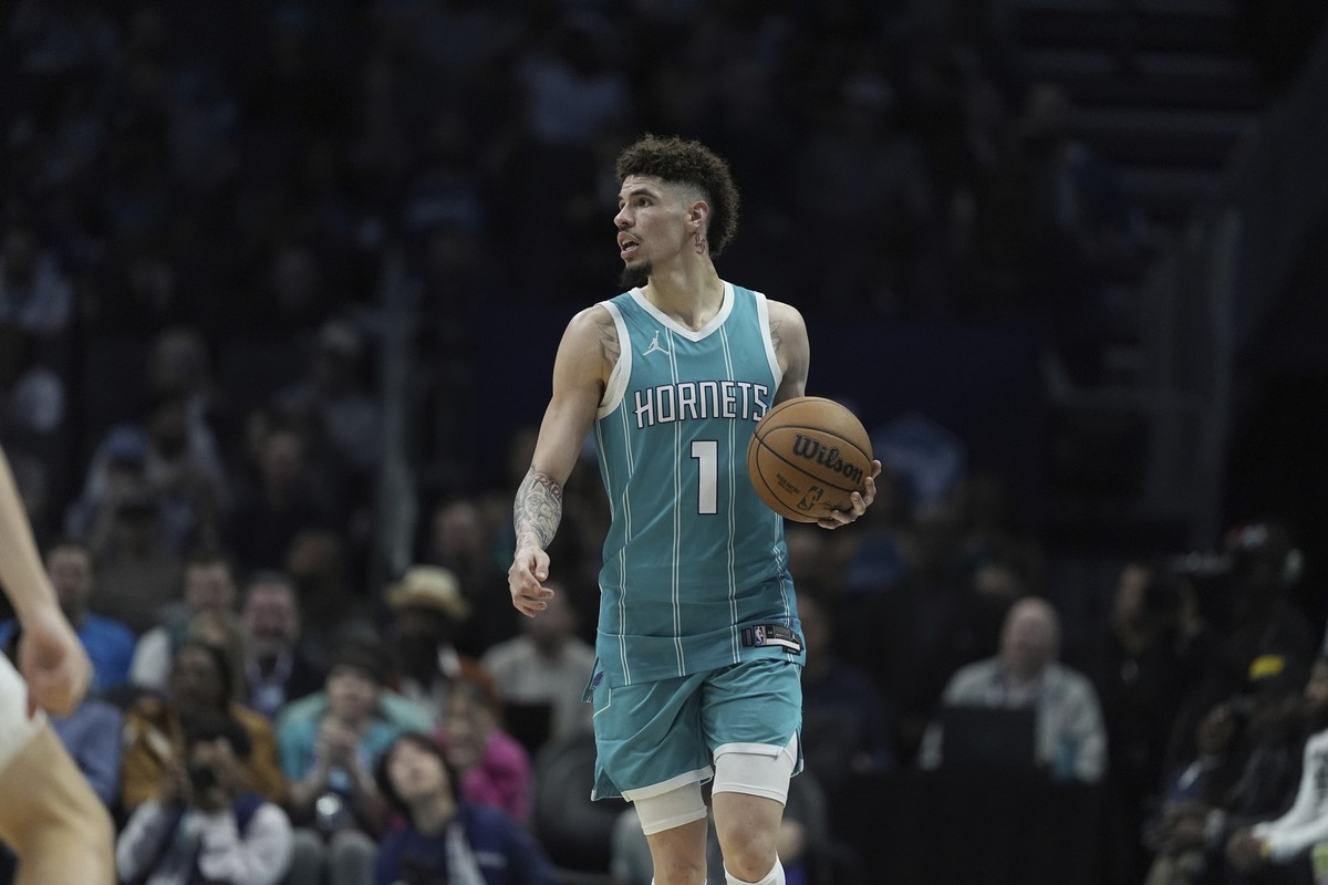 Charlotte Hornets guard LaMelo Ball brings the ball down court against the Indiana Pacers during the second half of an NBA basketball game Friday, Nov. 8, 2024, in Charlotte, N.C. (AP Photo/Chris Carl ...