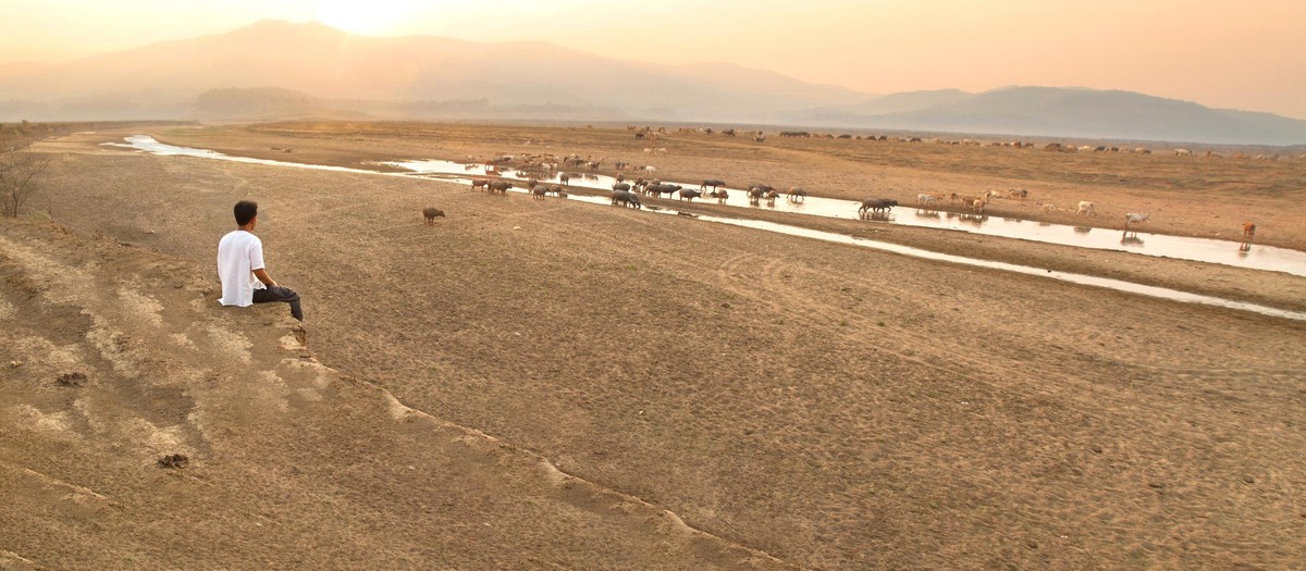 Man and Climate change drought on summer, panorama shot