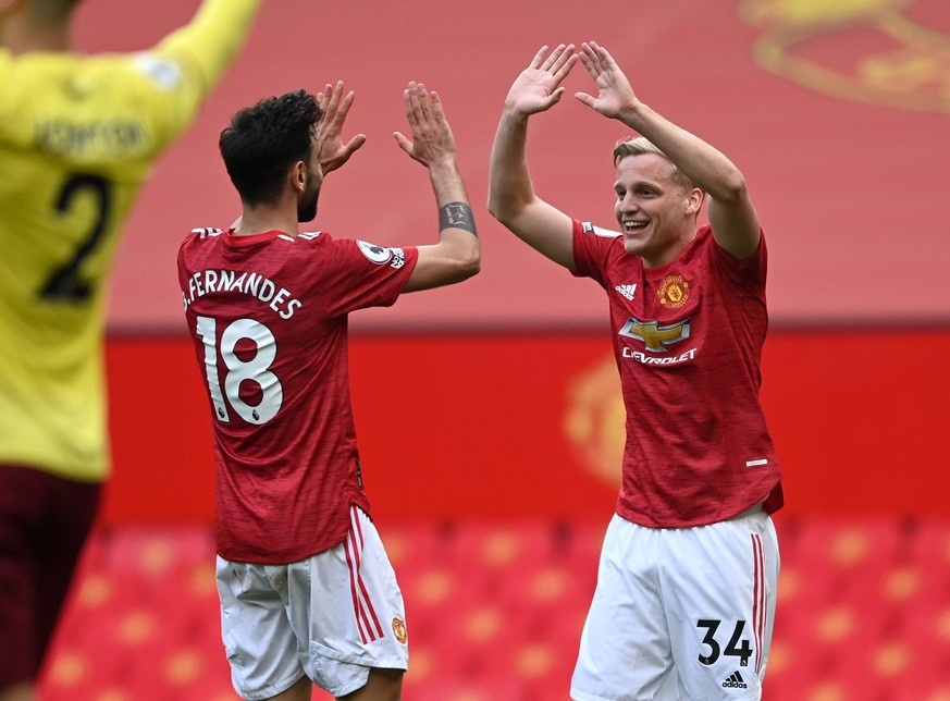 Manchester United, ManU v Burnley - Premier League - Old Trafford Manchester United s Bruno Fernandes and Donny van de Beek celebrate their side s third goal of the game, scored by Edinson Cavani not  ...