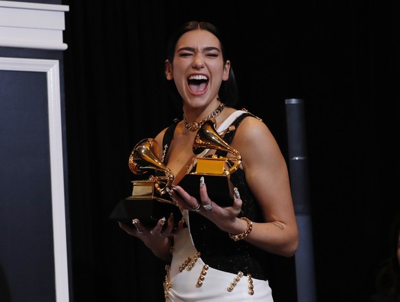 61st Grammy Awards - Photo Room - Los Angeles, California, U.S., February 10, 2019 - Dua Lipa poses backstage with her awards for Best Dance Recording for &quot;Electricity&quot; and for Best New Arti ...