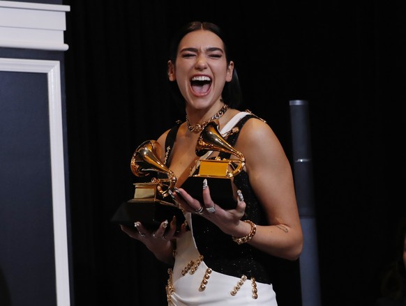 61st Grammy Awards - Photo Room - Los Angeles, California, U.S., February 10, 2019 - Dua Lipa poses backstage with her awards for Best Dance Recording for "Electricity" and for Best New Arti ...