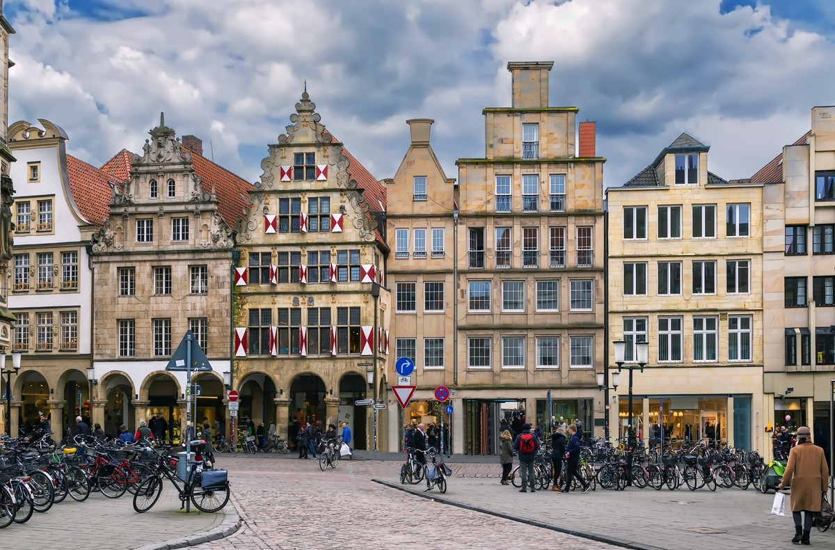 Prinzipalmarkt is historic street with buildings with picturesque pediments attached to one another in Munster, Germany