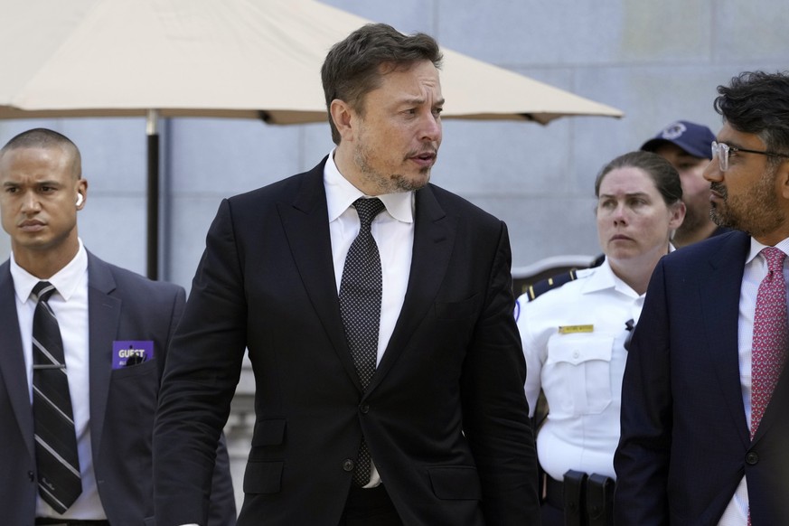 Elon Musk, CEO of X, the company formerly known as Twitter, departs from a closed-door gathering of leading tech CEOs to discuss the priorities and risks surrounding artificial intelligence and how it ...