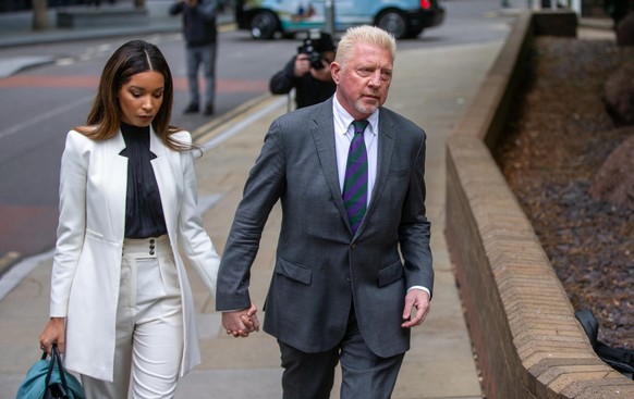 April 29, 2022, London, England, United Kingdom: Former German tennis star BORIS BECKER with his partner LILIAN DE CARVALHO MONTEIRO arrives at Southwark Crown Court in London for sentencing. (Credit  ...