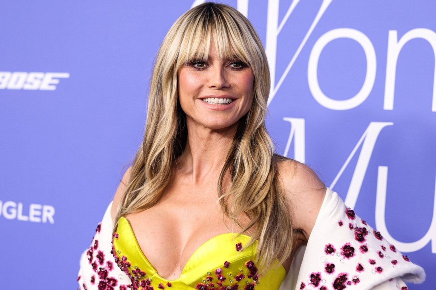 2023 Billboard Women In Music Heidi Klum wearing a Miss Sohee dress, a Judith Leiber clutch, and Anabella Chan jewelry arrives at the 2023 Billboard Women In Music held at the YouTube Theater on March ...