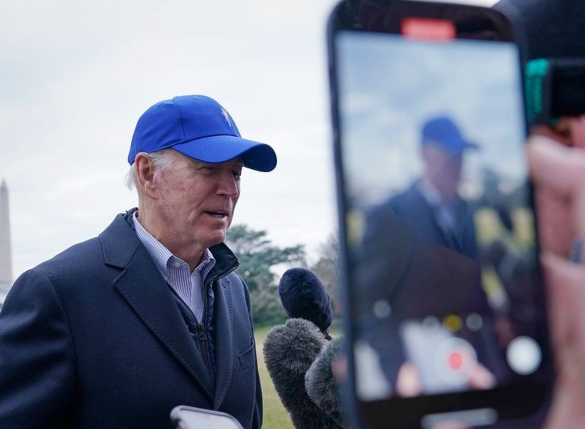 President Joe Biden talks with reporters after returning on the South Lawn of the White House in Washington, Monday, Feb. 6, 2023, from a weekend at Camp David in Maryland. (AP Photo/Susan Walsh)