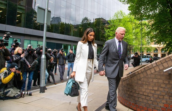 April 29, 2022, London, England, United Kingdom: Former German tennis star BORIS BECKER with his partner LILIAN DE CARVALHO MONTEIRO arrives at Southwark Crown Court in London for sentencing. (Credit  ...