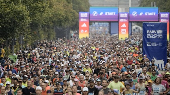 Runners start in the Berlin Marathon in Berlin, Germany, Sunday, Sept. 24, 2023. (AP Photo/Markus Schreiber)