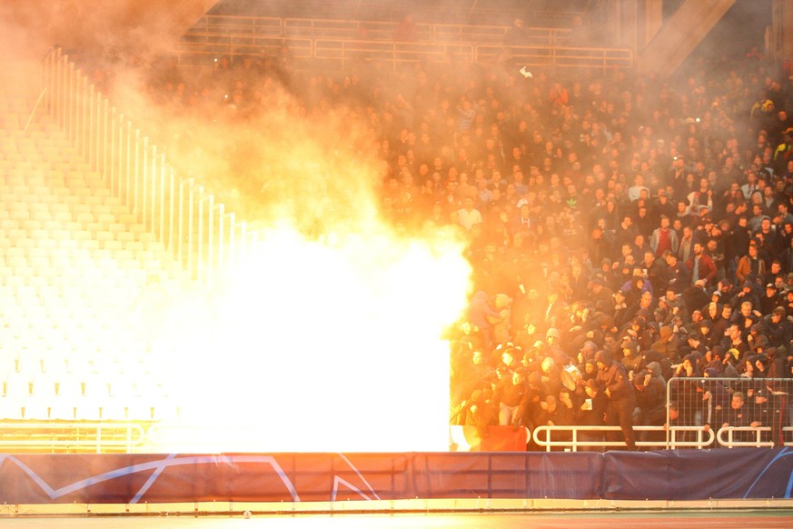 AEK Athens v Ajax Amsterdam UEFA Champions League A petrol bomb goes off in front of Ajax Amsterdam fans ahead of the UEFA Champions League match at Olympic Stadium, Athens PUBLICATIONxNOTxINxUK Copyr ...