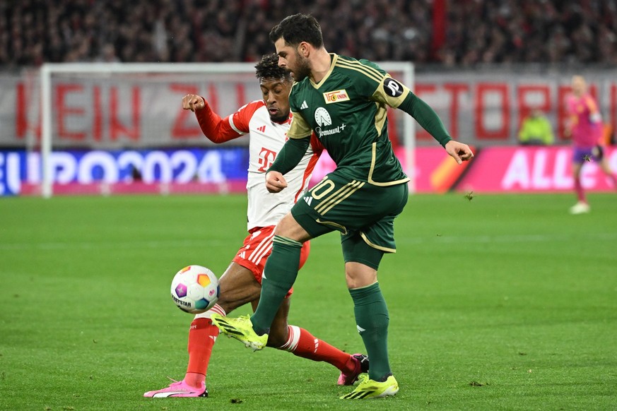 24.01.2024, Bayern, München: Fußball: Bundesliga, Bayern München - 1. FC Union Berlin, 13. Spieltag, Allianz Arena: Kingsley Coman von München (l) und Kevin Volland von Berlin in Aktion. WICHTIGER HIN ...