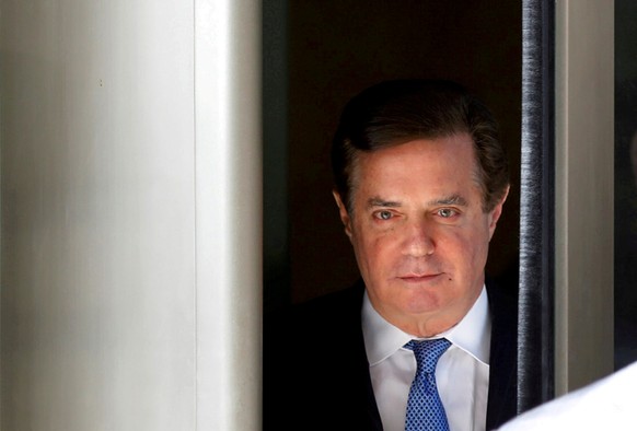FILE PHOTO: Former Trump campaign manager Paul Manafort departs from U.S. District Court in Washington, U.S., February 28, 2018. REUTERS/Yuri Gripas/File Photo - RC1653DF9D00