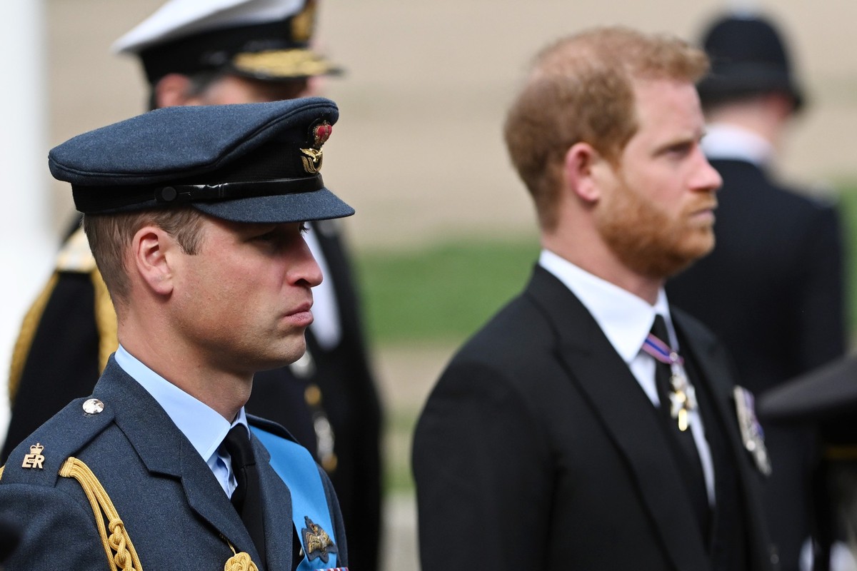 LONDON, ENGLAND - SEPTEMBER 19: Prince William, Prince of Wales and Prince Harry, Duke of Sussex follow behind The Queen's funeral cortege borne on the State Gun Carriage of the Royal Navy as it ...