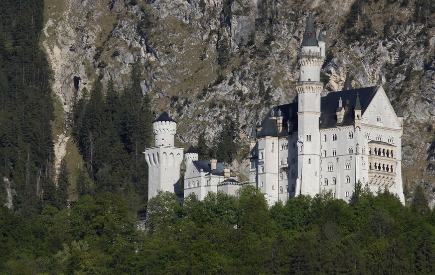 FILE - Castle Neuschwanstein, a 19th century creation by Bavaria&#039;s fairy tale king Ludwig II and world renowned tourist attraction, is pictured in Hohenschwangau near Fuessen, southern Germany, o ...