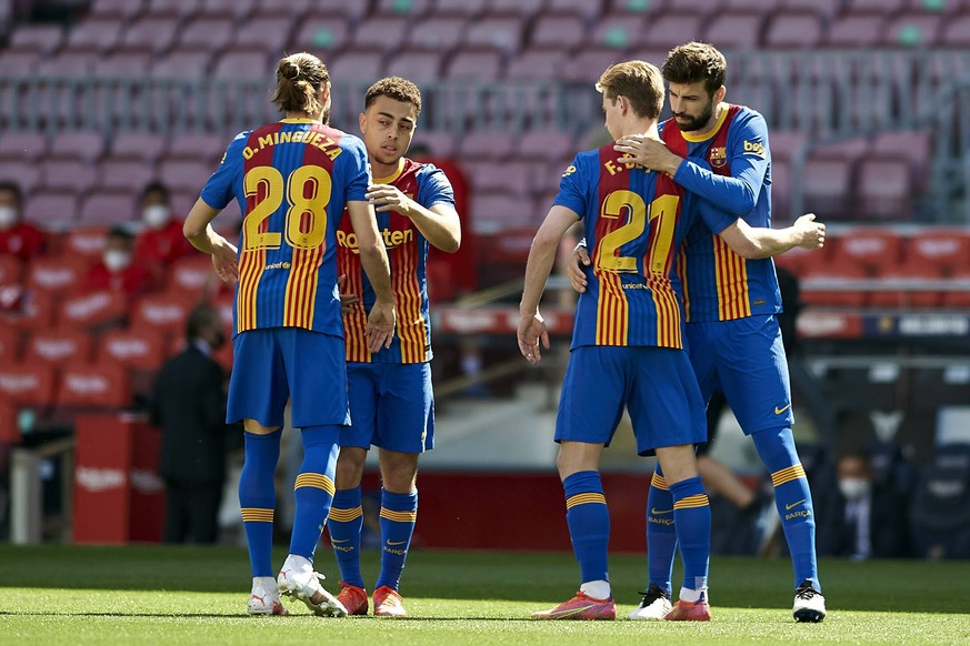 May 8, 2021, Barcelona, Spain: Gerard Pique, Frenkie de Jong, Sergino Dest of FC Barcelona, Barca during the Liga match between FC Barcelona and Atletico de Madrid at Camp Nou in Barcelona, Spain. Bar ...