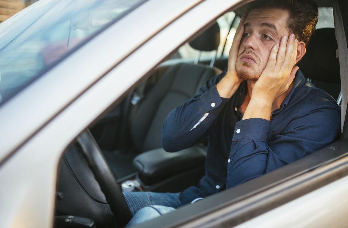Desperate young driver, can&#039;t stand the traffic jam