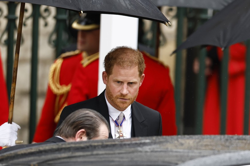 LONDON, ENGLAND - MAY 06: Prince Harry, Duke of Sussex departs the Coronation of King Charles III and Queen Camilla on May 06, 2023 in London, England. The Coronation of Charles III and his wife, Cami ...