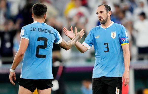 Mandatory Credit: Photo by Dave Shopland/Shutterstock 13626521db Diego Godin of Uruguay and Jose Gimenez of Uruguay. Uruguay v Korea Republic, FIFA World Cup, WM, Weltmeisterschaft, Fussball 2022, Gro ...