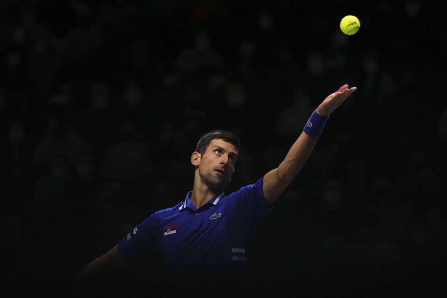 211204 -- MADRID, Dec. 4, 2021 -- Novak Djokovic of Serbia competes against Marin Cilic of Croatia during the 2021 Davis Cup Finals semifinal between Croatia and Serbia in Madrid, Spain, Dec. 3, 2021. ...