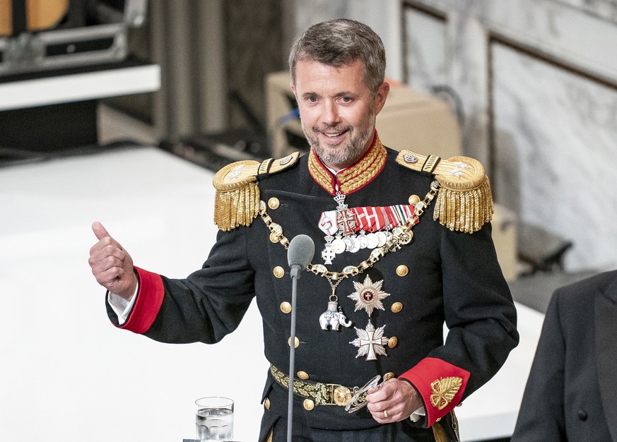 FILE - Danish Crown Prince Frederik delivers his speech to Danish Queen Margrethe II at the gala banquet at Christiansborg Palace in Copenhagen, Denmark, Sunday, Sept. 11, 2022. As a teenager, Crown P ...