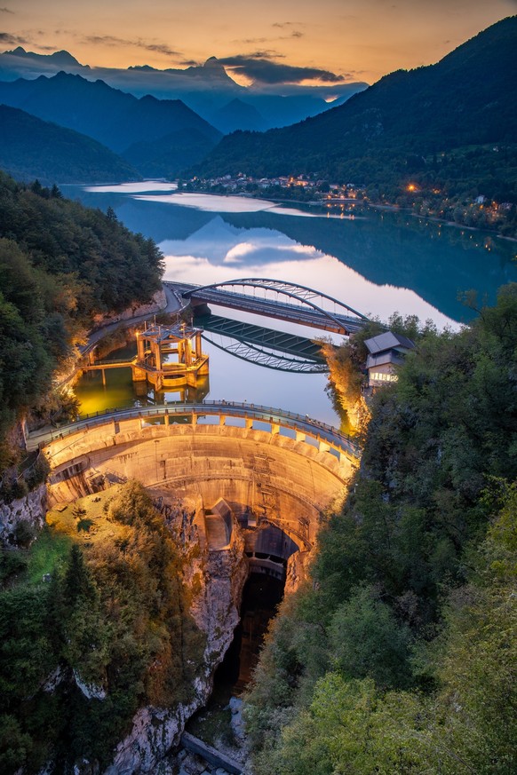 An aerial view of a hydropower station of Lago di Barcis lake in Italy