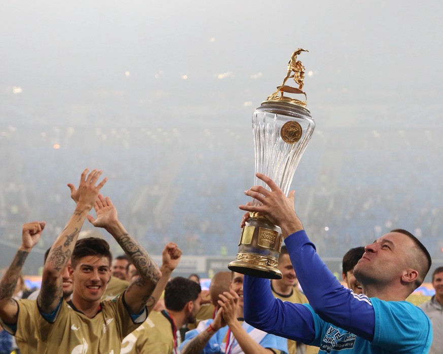 Russian Federation. St. Petersburg. Gazprom Arena. Football Club Zenith. Rewarding Zenit footballers with gold medals RPL and RPL Cup. Zenit was awarded the RPL champion cup. the fans; viewers; fans;  ...
