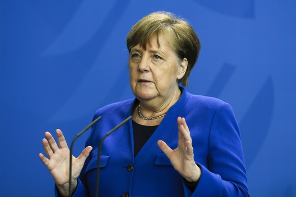 German Chancellor Angela Merkel brief the media about measures to avoid further spread of the coronavirus and the COVID -19 disease after a government meeting at the chancellery in Berlin, Germany, Mo ...