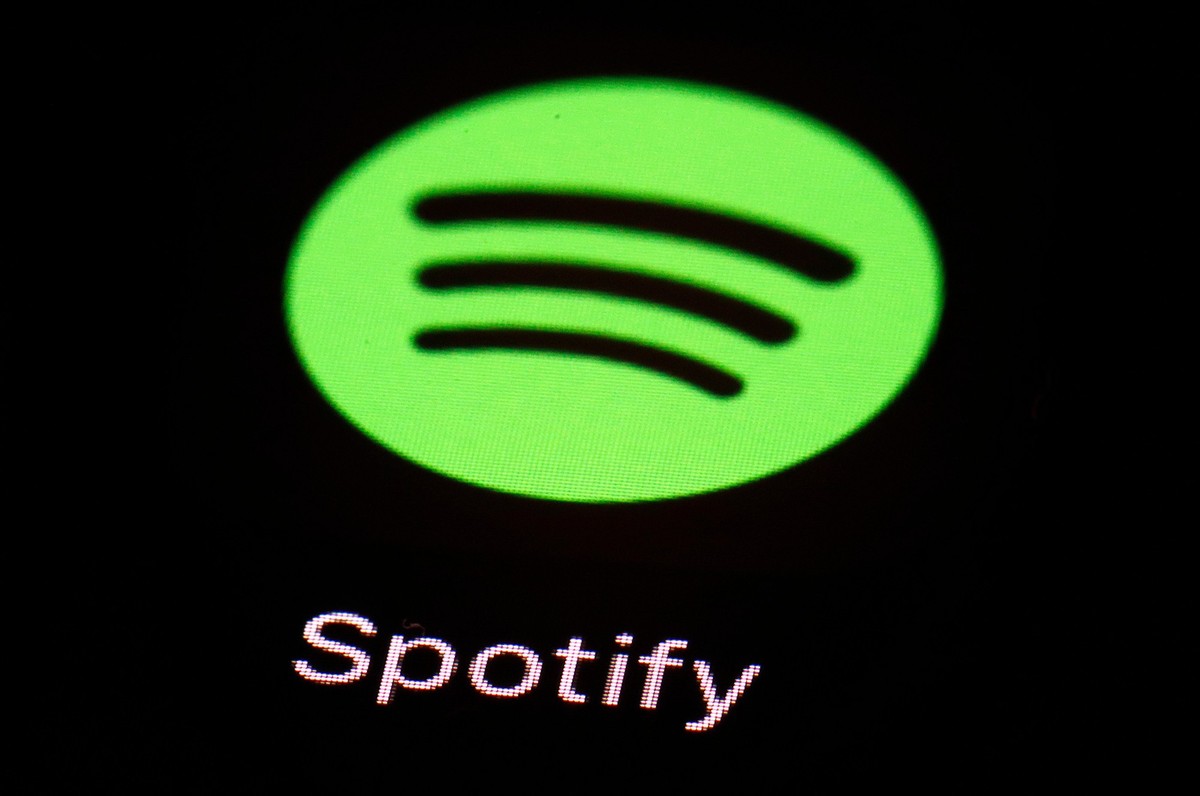 FILE - The Spotify app is displayed on an iPad in Baltimore, March 20, 2018. Since late last century and the early days of the web, providers of digital media like Netflix and Spotify have had a free  ...