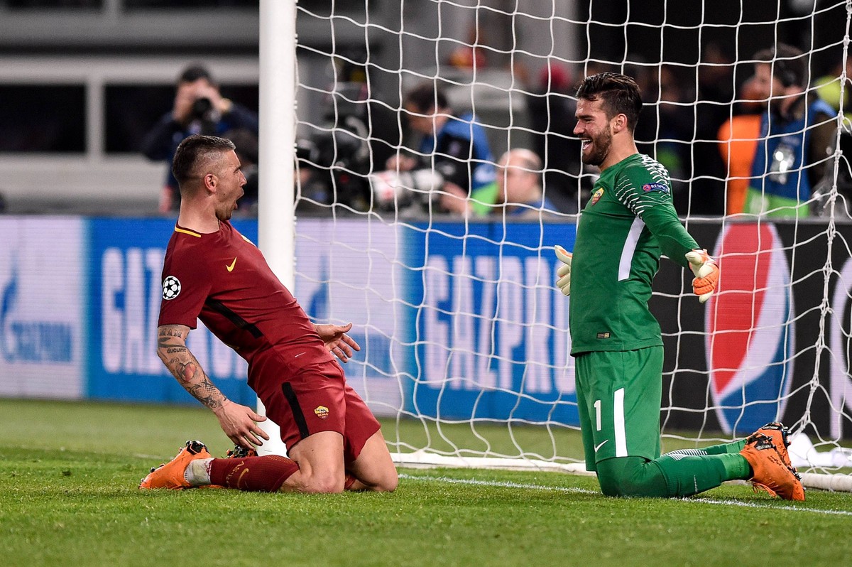 April 10, 2018 - Rome, Italy - Alessandro Florenzi of Roma celebrates with Aleksandar Kolarov of Roma at the end of the UEFA Champions League Quarter Final match between Roma and FC Barcelona Barca at ...