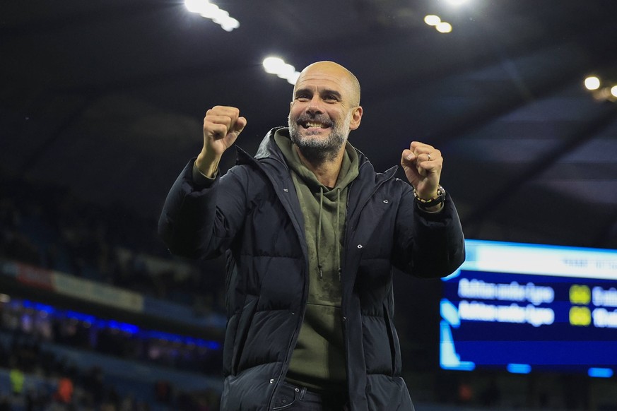 November 5, 2022, Manchester, Manchester, United Kingdom: Pep Guardiola the Manchester City manager celebrates the 2-1 victory in the Premier League match Manchester City vs Fulham at Etihad Stadium,  ...
