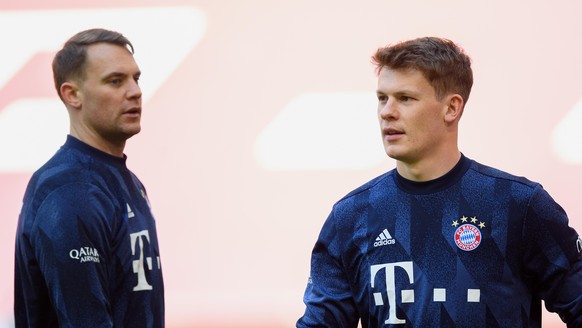 MUNICH, GERMANY - APRIL 10: Goalkeeper Manuel Neuer of FC Bayern München and Goalkeeper Alexander Nübel of FC Bayern München seen ahaed of the Bundesliga match between FC Bayern Muenchen and 1. FC Uni ...