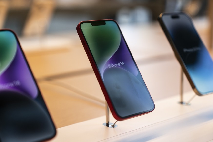 The new iPhone 14 smartphones are on display at an Apple Store at The Grove in Los Angeles, Friday, Sept. 16, 2022. Apple's iPhone 14 lineup and Apple Watch Series 8 are available to purchase in-store ...