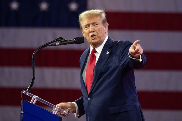February 24, 2024, Oxon Hill, Maryland, USA: Former United States President DONALD J TRUMP makes remarks at the 2024 Conservative Political Action Conference CPAC in National Harbor, Maryland. Oxon Hi ...