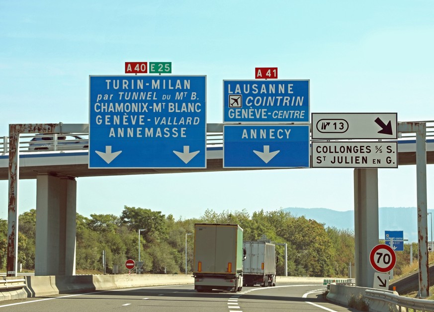 road sign with directions to go to French places in France