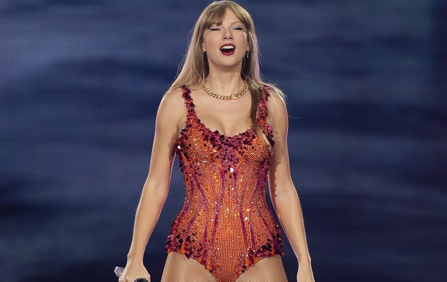 Taylor Swift performs at the Paris Le Defense Arena as a part of her Eras Tour concert in Paris, Thursday, May 9, 2024. (AP Photo/Lewis Joly)