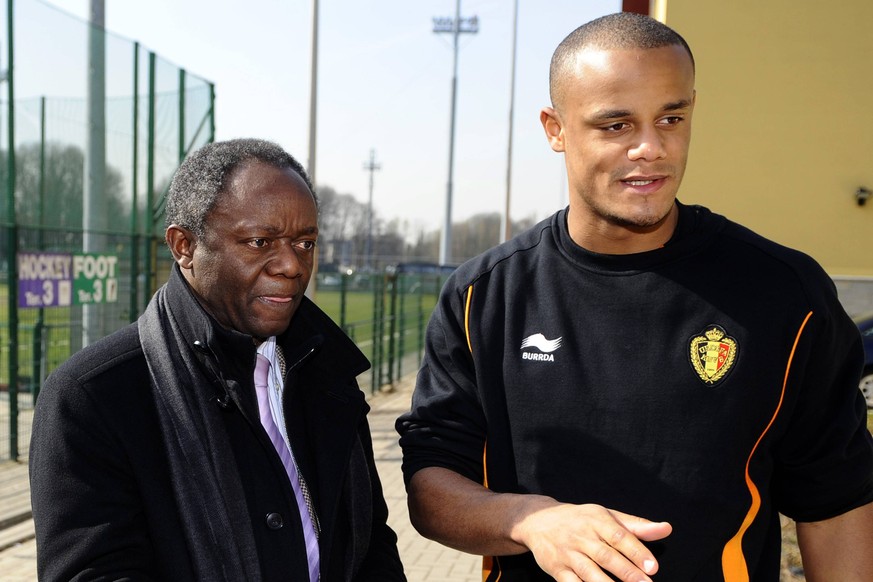 - BRUSSELS, BELGIUM: Belgium s Vincent Kompany and and his father Pierre pictured during a training session of the Red Devils, the Belgian national soccer team, in Brussels, Tuesday 22 March 2011. The ...