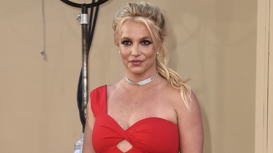 FILE - Britney Spears arrives at the Los Angeles premiere of &quot;Once Upon a Time in Hollywood,&quot; on July 22, 2019. A man once briefly married to Britney Spears was convicted Friday, Aug. 12, 20 ...