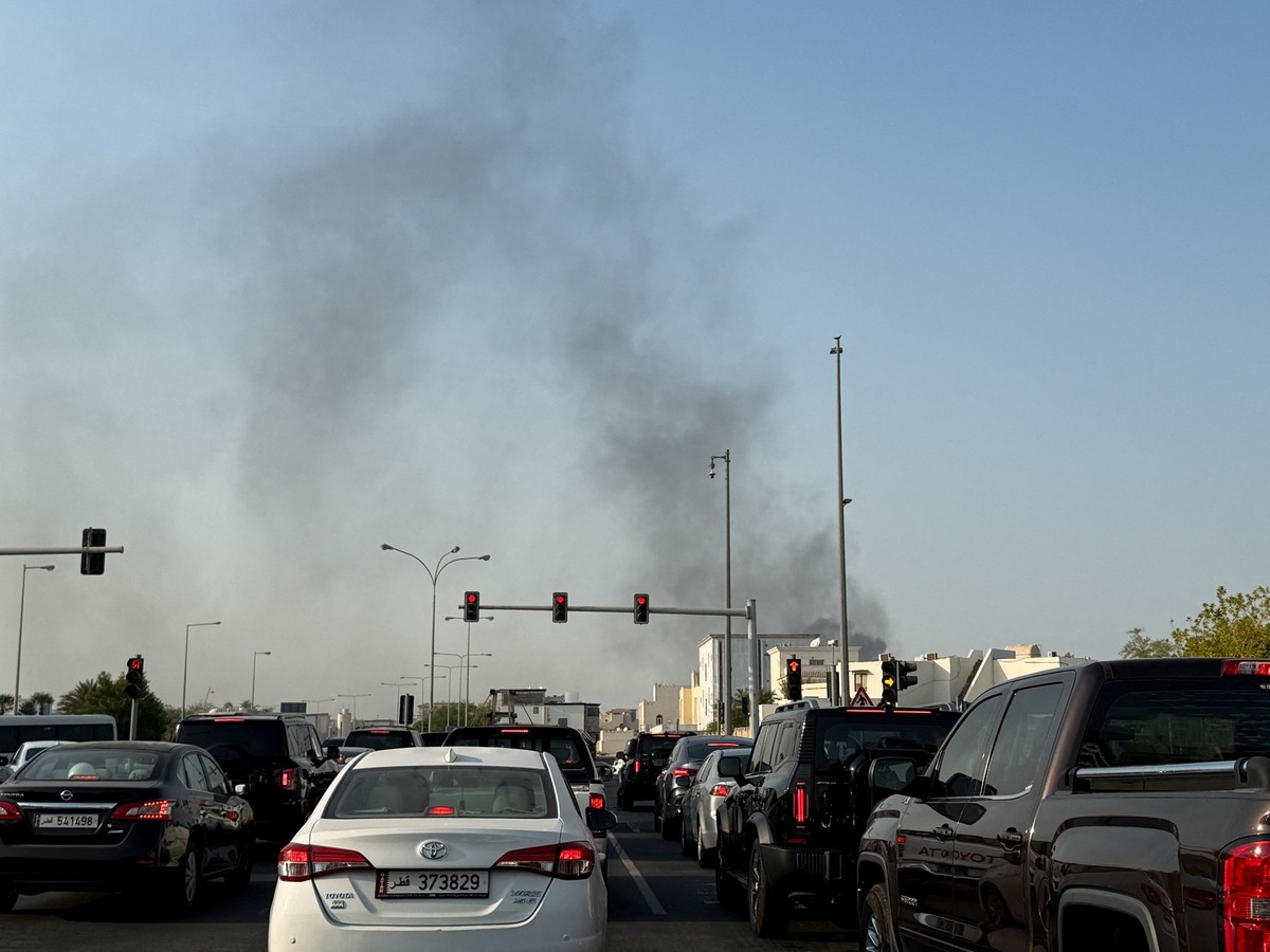 Smoke rises after several blasts were heard in Doha, Qatar, September 9, 2025. REUTERS/Ibraheem Abu Mustafa