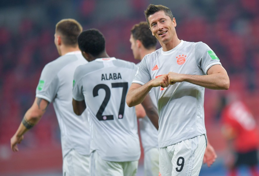 210209 -- DOHA, Feb. 9, 2021 -- Robert Lewandowski of Bayern Munich celebrates scoring during the FIFA Club World Cup semi-final football match between Egypt s Al Ahly and Germany s Bayern Munich at A ...