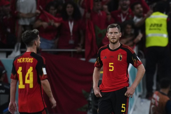 Belgium's Jan Vertonghen, right, stands after a 0-2 lost against Morococo in a World Cup group F soccer match at the Al Thumama Stadium in Doha, Qatar, Sunday, Nov. 27, 2022. (AP Photo/Manu Fernandez)